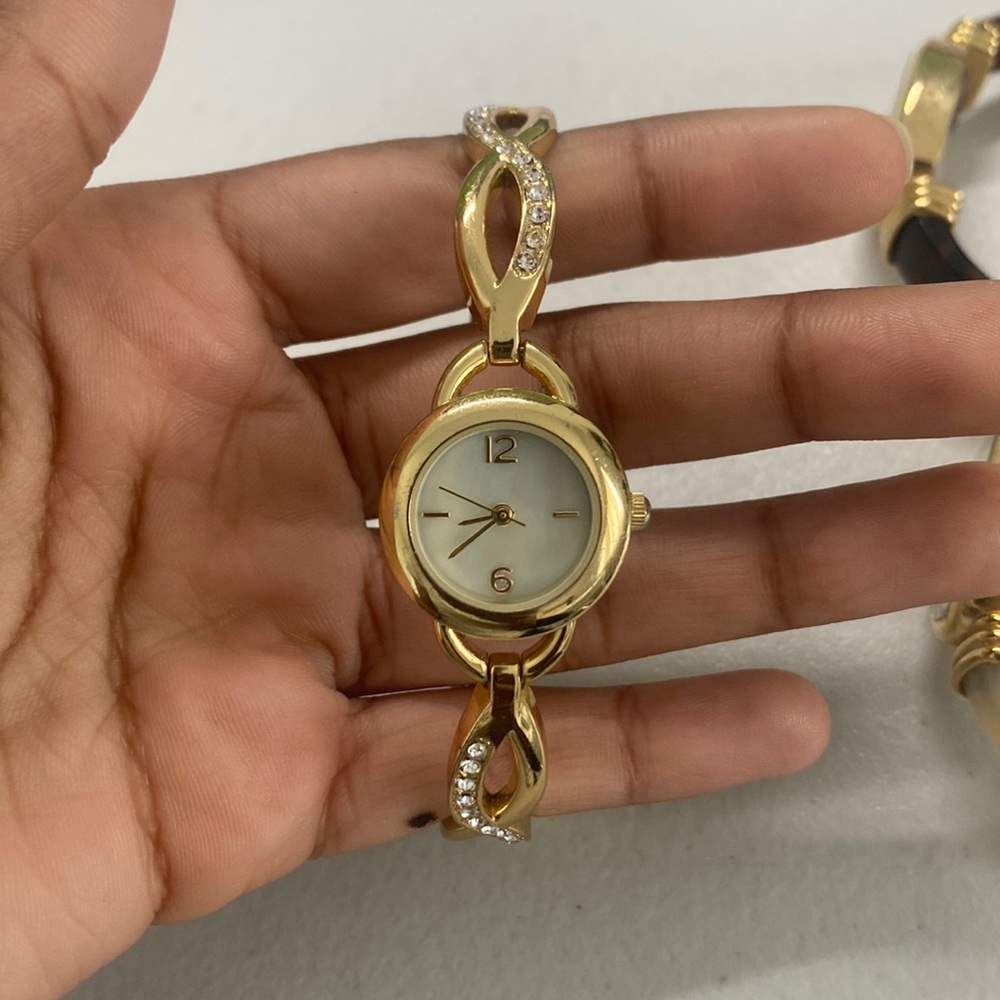 Gold tone watch